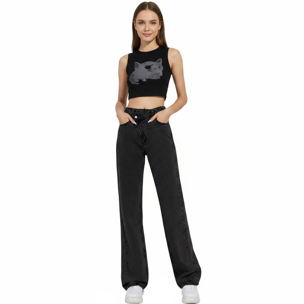 Woman wearing a black sleeveless top with a graphic design and black pants on a white background