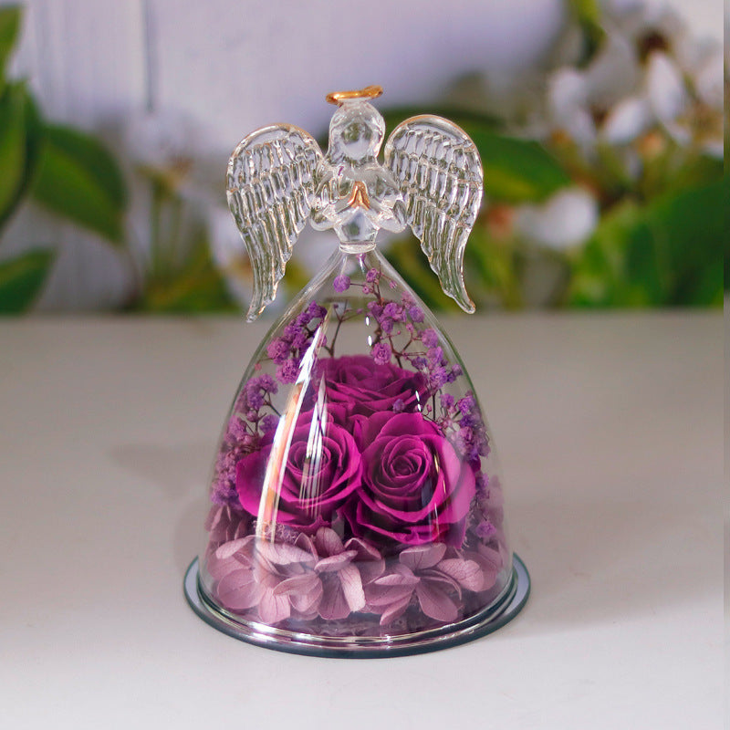 dried rose gift box top view of glass bottle dome with angel figure and preserved rose for elegant home decor
