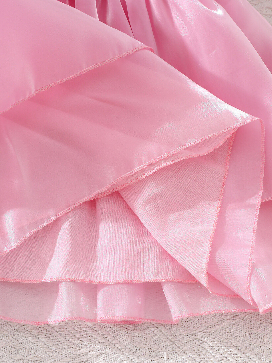 Elegant girls celebration dress with puff sleeves, fitted waist, and flared hem for standout moments