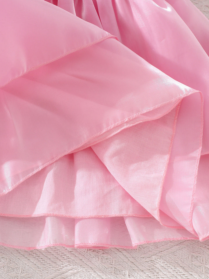 Elegant girls celebration dress with puff sleeves, fitted waist, and flared hem for standout moments