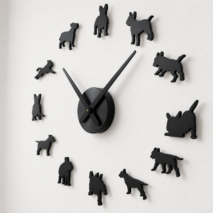Black DIY wall clock shown at an angle with twelve dog silhouette markers, central round hub and slim clock hands on a white wall.