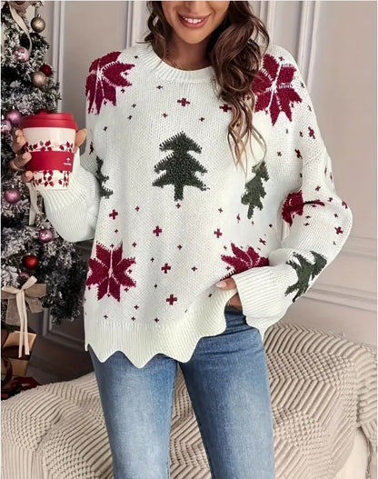 Women's christmas loose casual sweater folded flat lay with candy canes