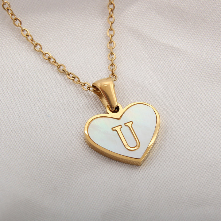 Personalized heart letter chain with 45+5 cm length, gold-plated finish and stainless steel construction - Product reference.