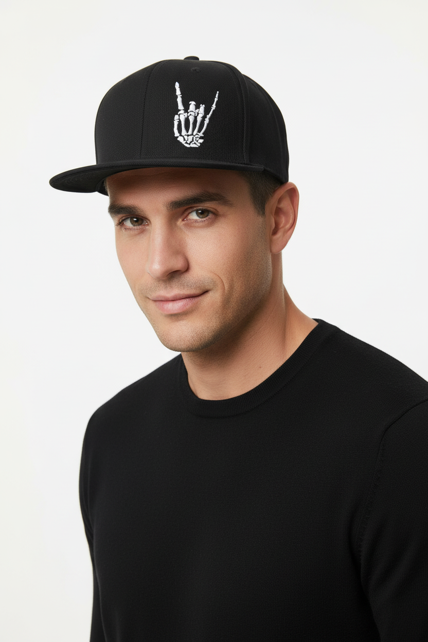Retro flat brim hip hop baseball cap in black with embroidered detail, front view on white background
