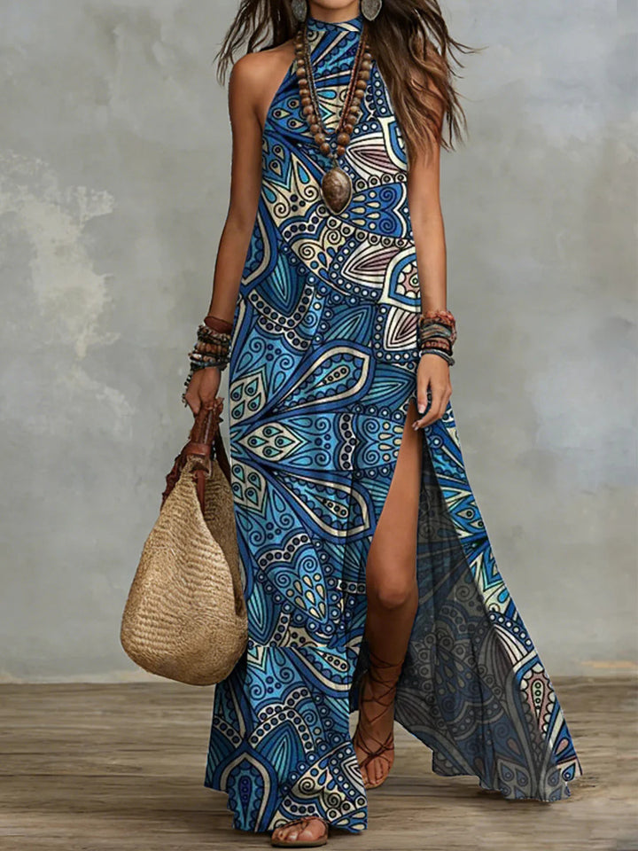 Flowy pink printed maxi dress with high neckline, side slit and loose straight cut for comfortable summer dressing