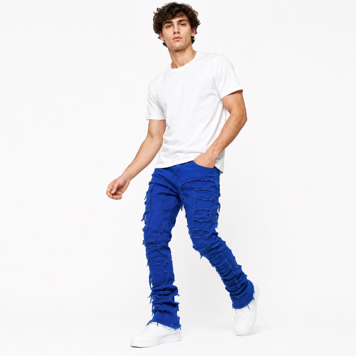 Mens fashion jeans with stacked ankle design and patchwork ripped detailing