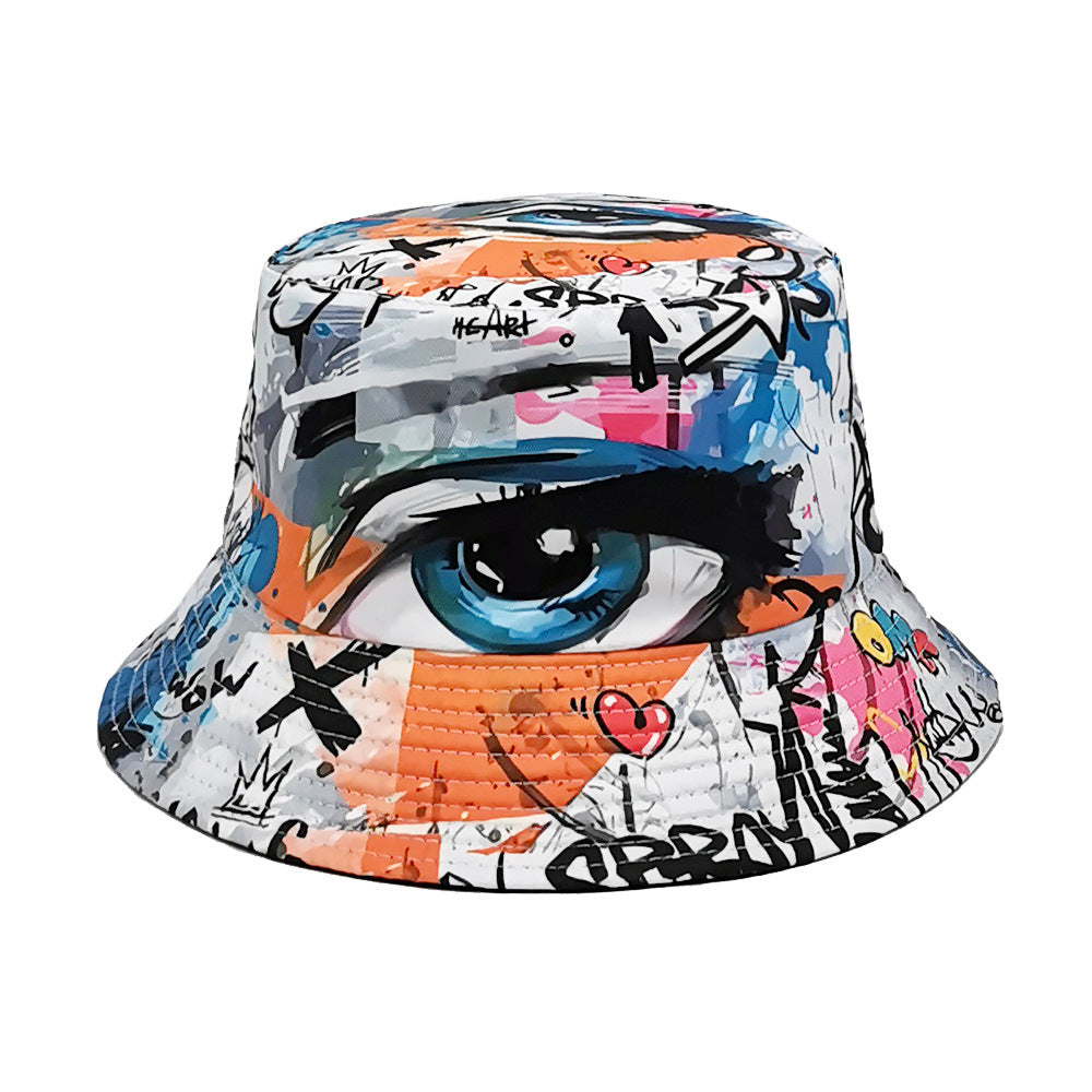 eye print bucket hat front view, white bucket hats aesthetic with graffiti print for streetwear outfits and photo days
