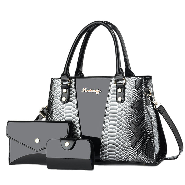 Large handbag set in PU material with patch pocket, inner zipper sections and compact companion bags for busy days ahead now.