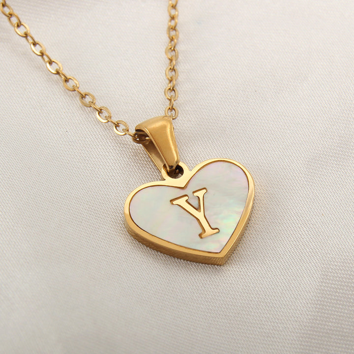 Gold-plated heart letter necklace with stainless steel material, 45+5 cm chain and selectable initial - Product detail image.
