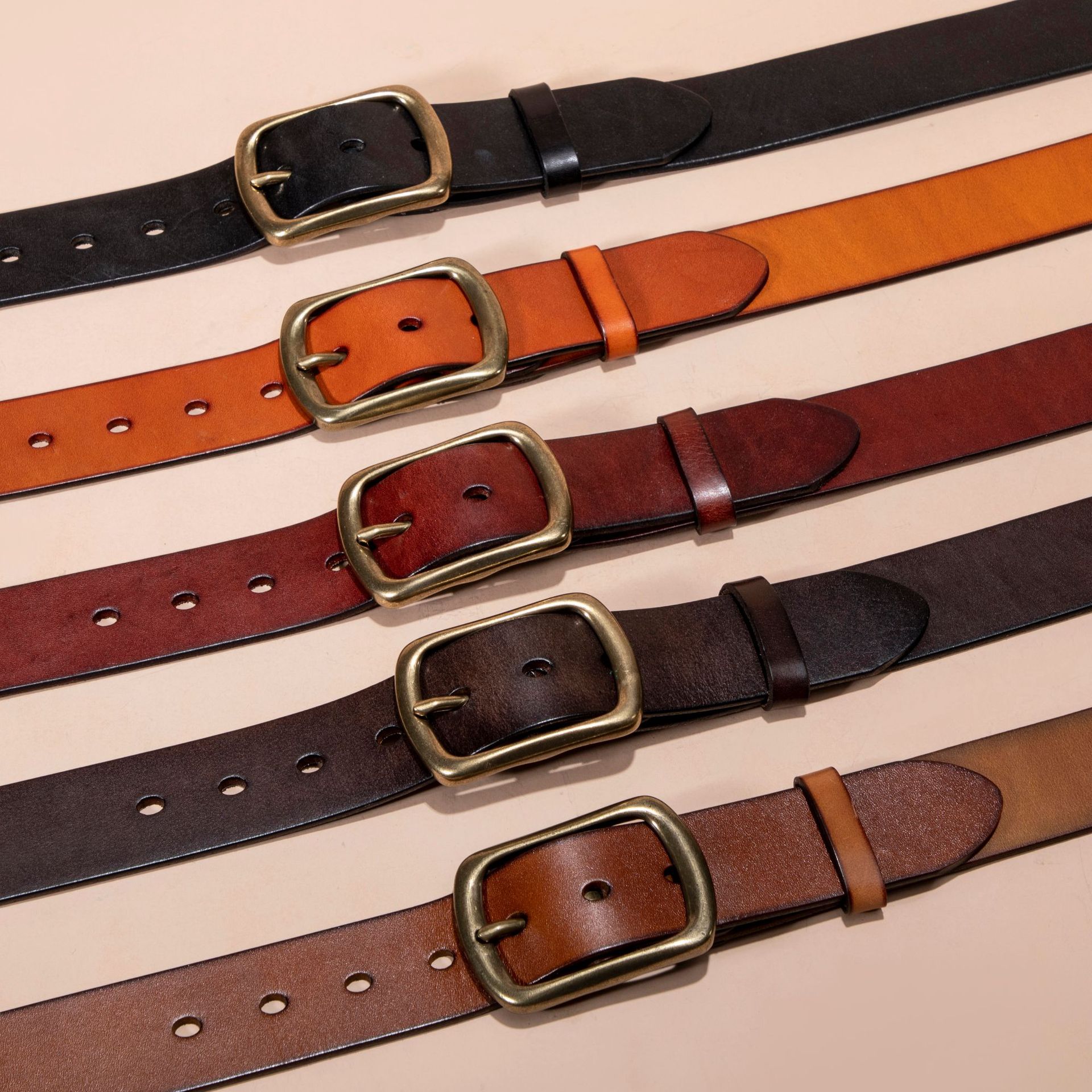 vintage cowhide leather belt with brass pin buckle styled on european man