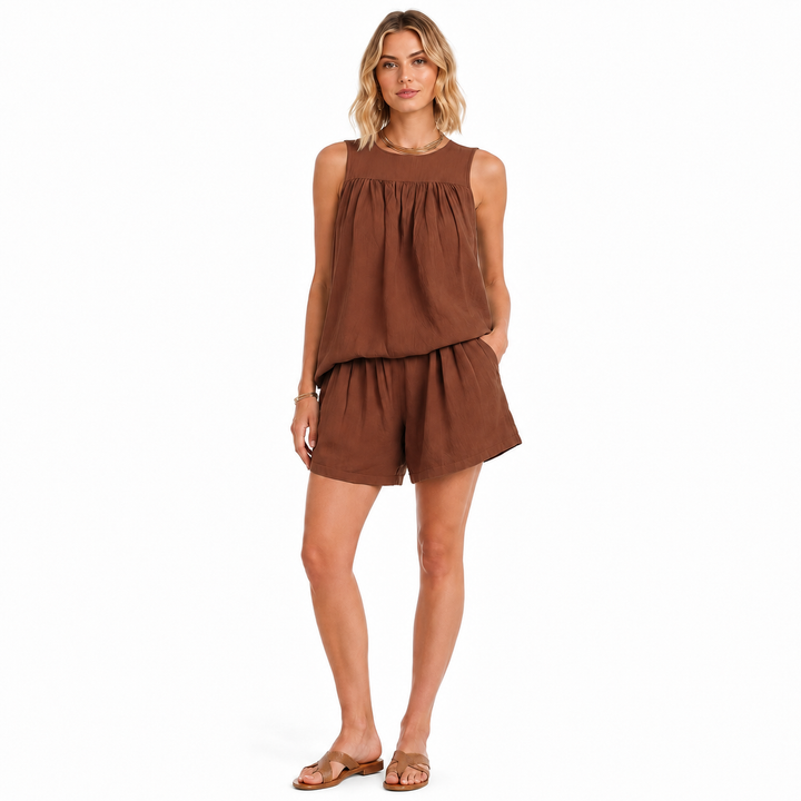 Pleated sleeveless top and wide-leg shorts set for women shown as a coordinated casual outfit with a relaxed silhouette.