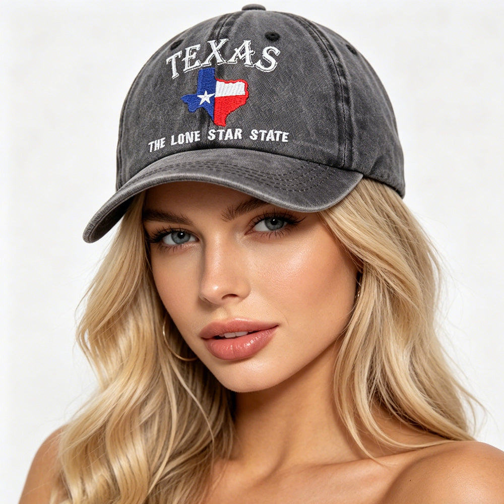 Front view of vintage washed cotton cap with Texas embroidery and curved brim on a clean white background.