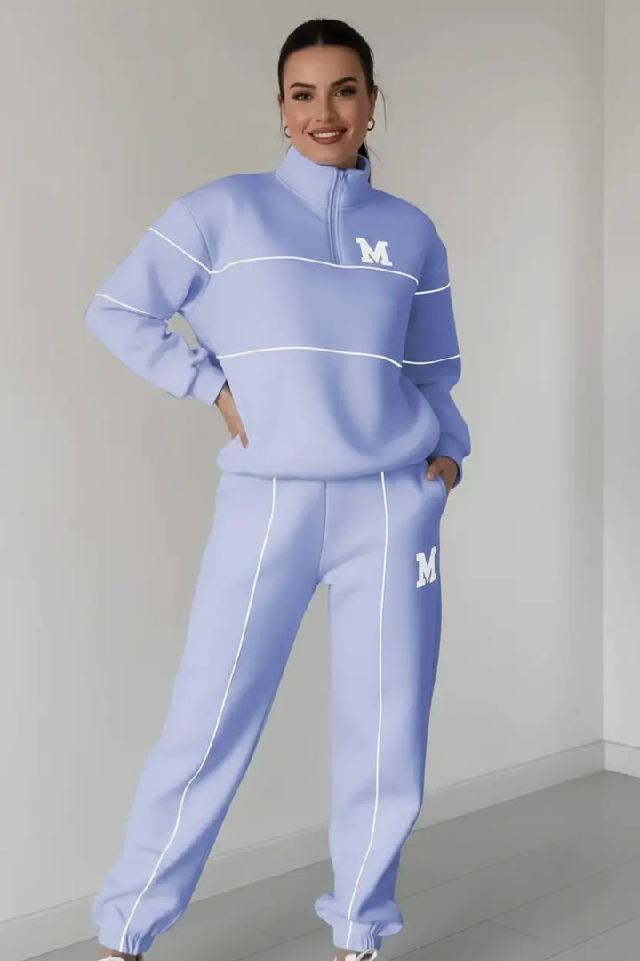 Womens 2 Piece Lounge Set back view showing relaxed cut and proportional fit in neutral space