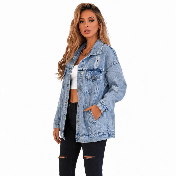 Light blue loose fit denim jacket side view showing distressed sleeves and casual silhouette