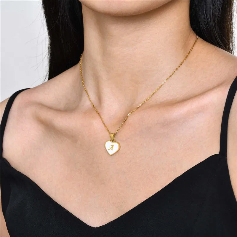 Initial personalized necklace in stainless steel with gold-plated heart pendant and personal letter selection - Product view.