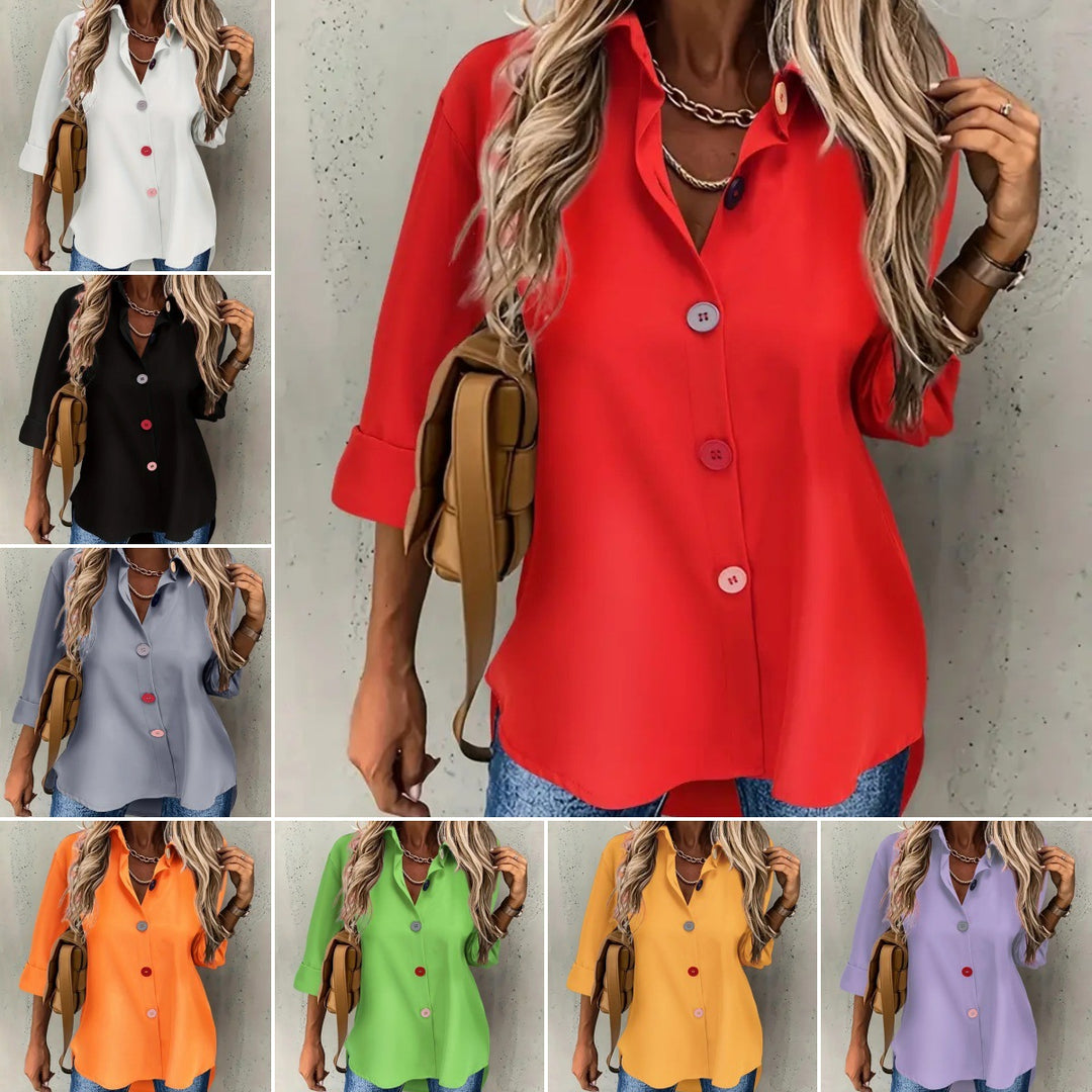 Red button-up shirt worn by a person with a neutral background