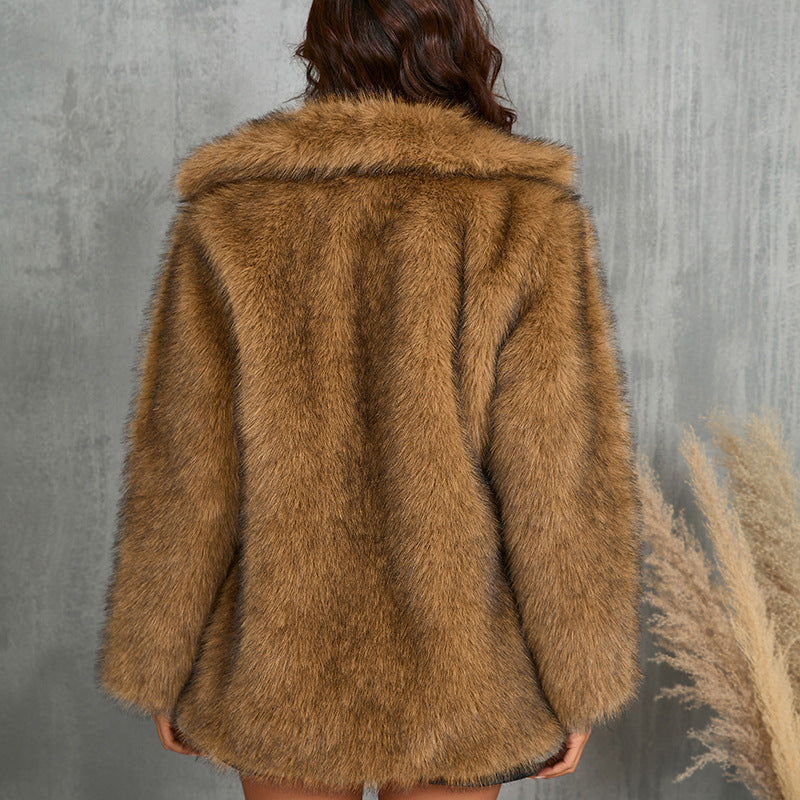 women's faux fur coat side angle showing drape, sleeve volume, and pocket placement for easy cold-weather wear
