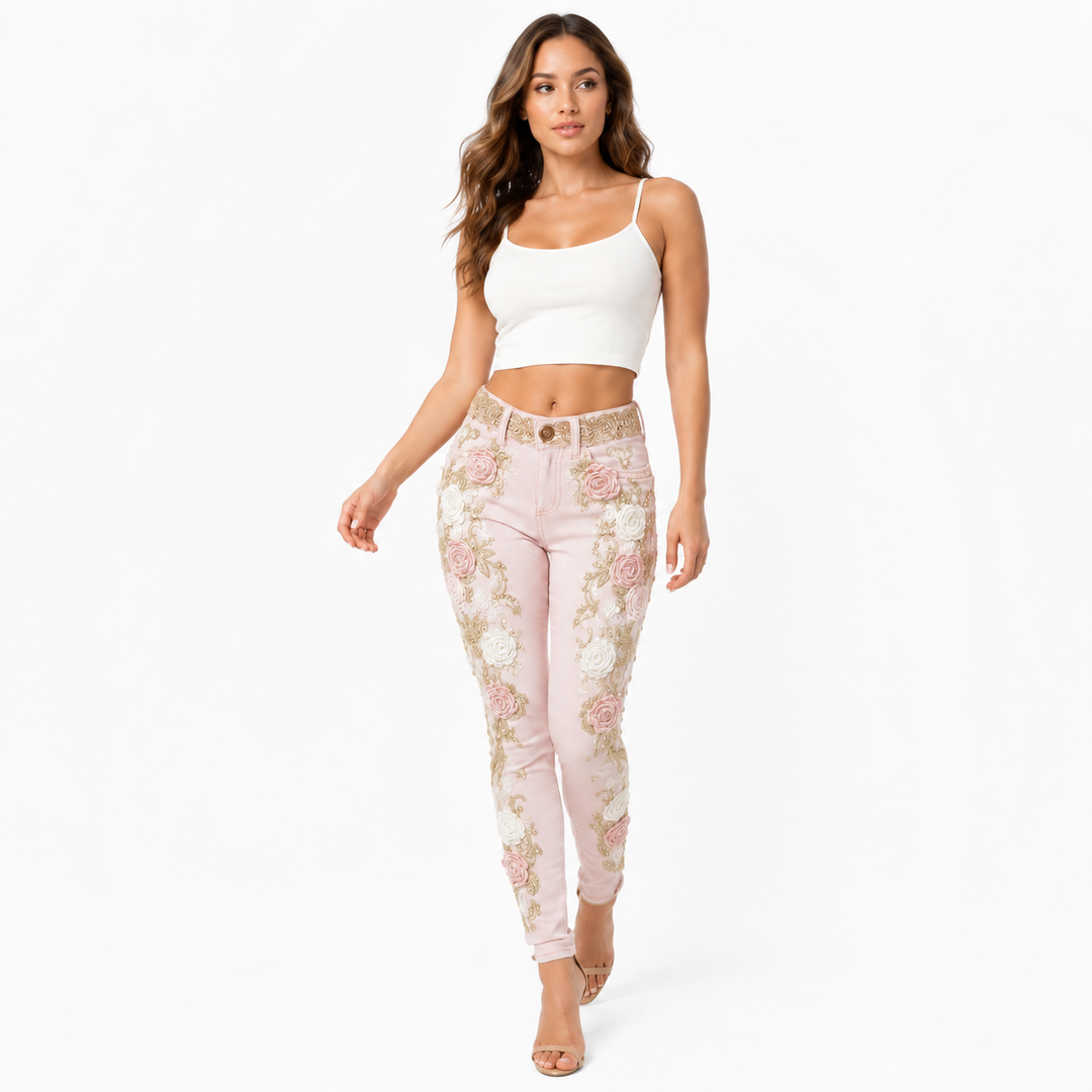 Pink rose embroidered jeans with gold detailing - walking front view on white woman model
