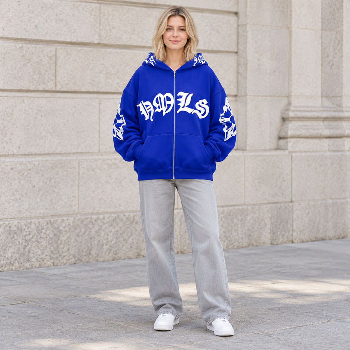Full-body model wearing the blue Gothic print zip hoodie