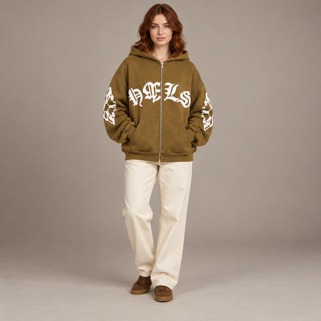 Full-body model wearing the light brown Gothic print zip hoodie