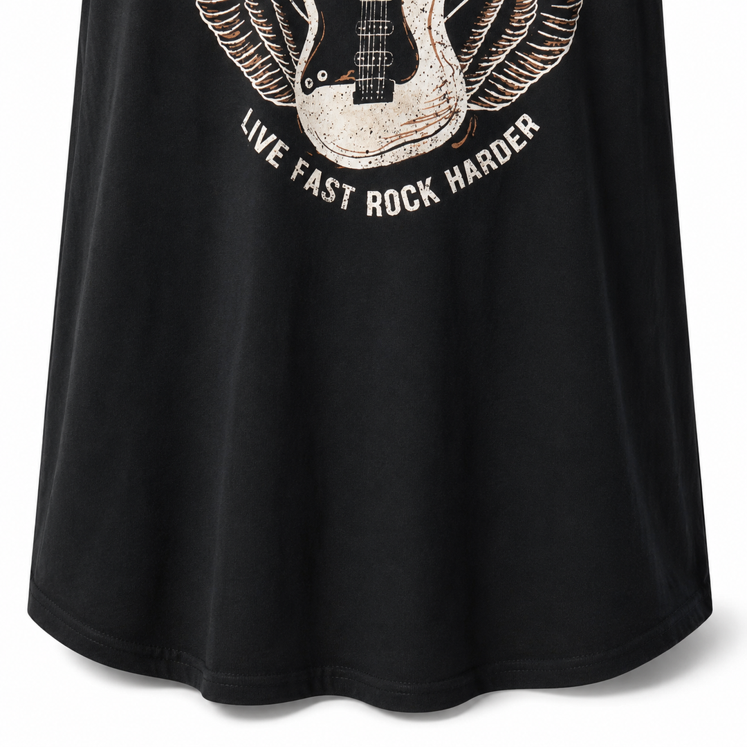 Lower hem detail of the black graphic tee dress, showing stitching, fabric drape and part of the front print.