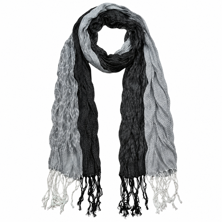 Reverse view of the grey-and-black jacquard wrap showing woven pattern and fringe.
