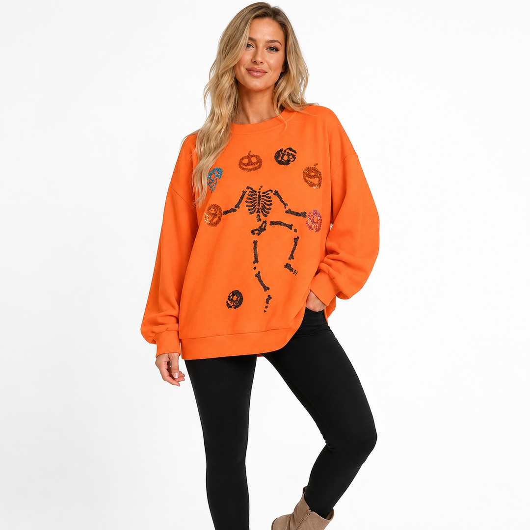 Women’s Halloween Skeleton Pumpkin sweatshirt - clean lifestyle styling with orange oversized crewneck