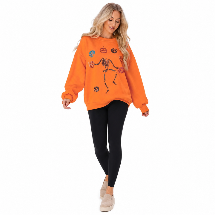 Halloween Skeleton Pumpkin women’s sweatshirt - natural motion pose in bright orange on white background
