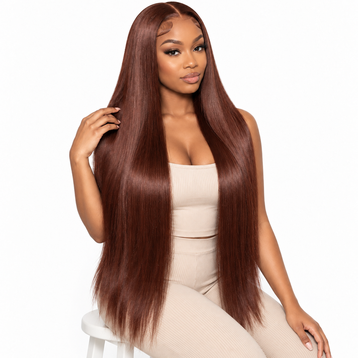 24 inch HD lace front wig worn long and straight in a clean studio pose with rich chestnut brown color.