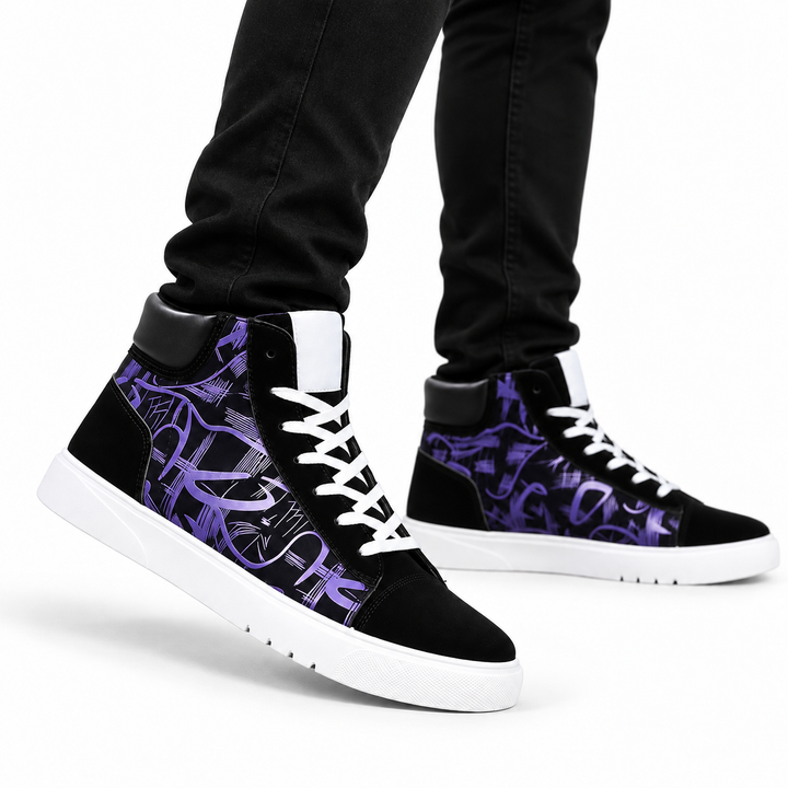 Purple graphic high top sneakers worn by a male model in black pants on a white background