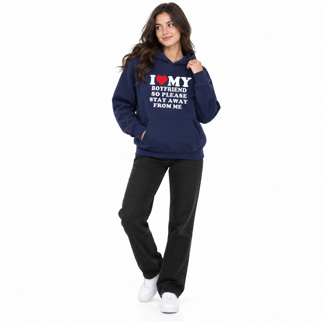Second woman wearing navy boyfriend quote hoodie on white background