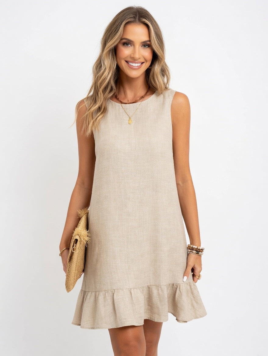 Summer ruffle dress women outdoor beach setting casual daytime loose silhouette effortless vacation-ready look
