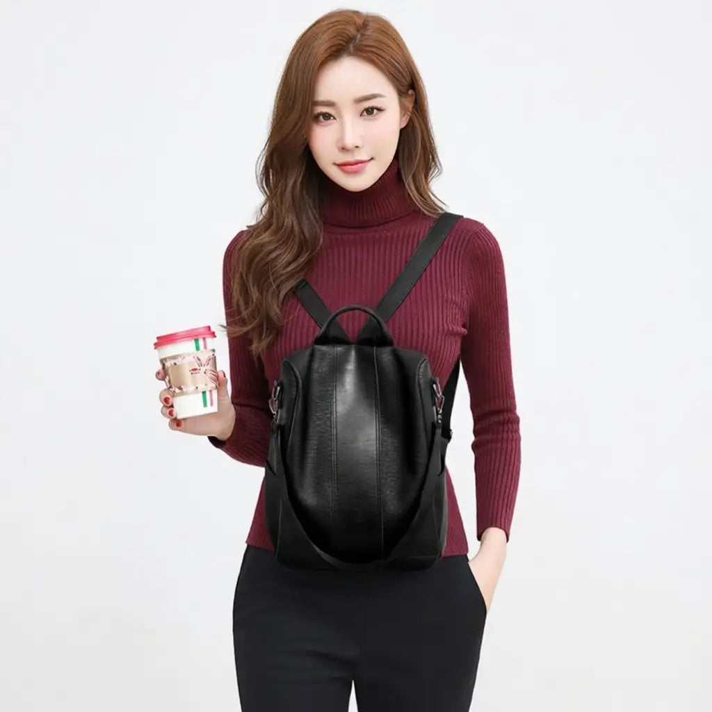 women's solid color large capacity backpack worn on shoulder urban professional styling