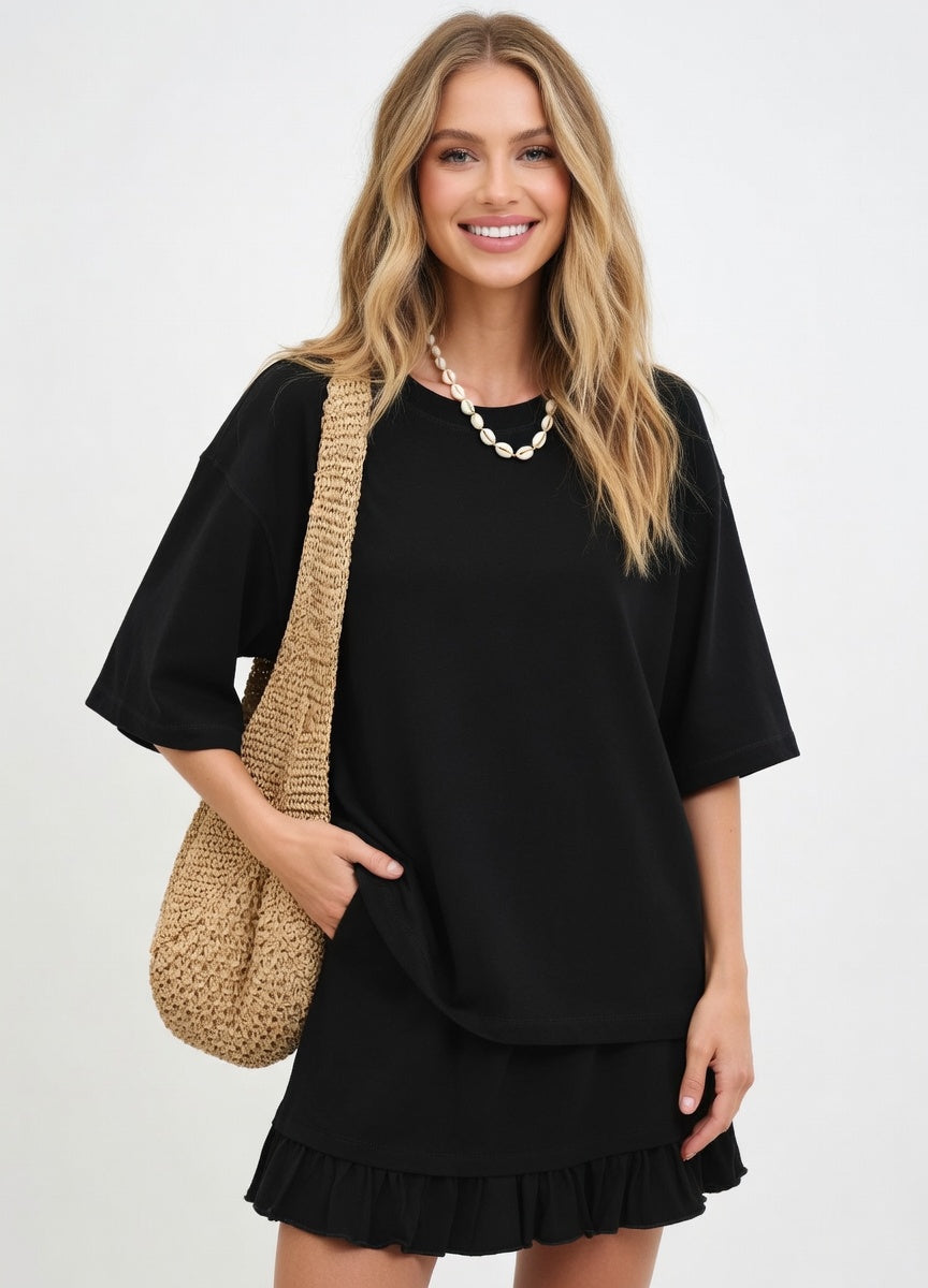 Elegant two piece skirt set for women featuring loose fit shirt and matching mini skirt look