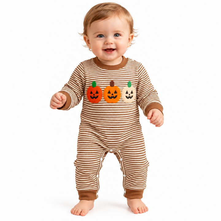 Light brown striped baby jumpsuit with pumpkin graphics, full front model view