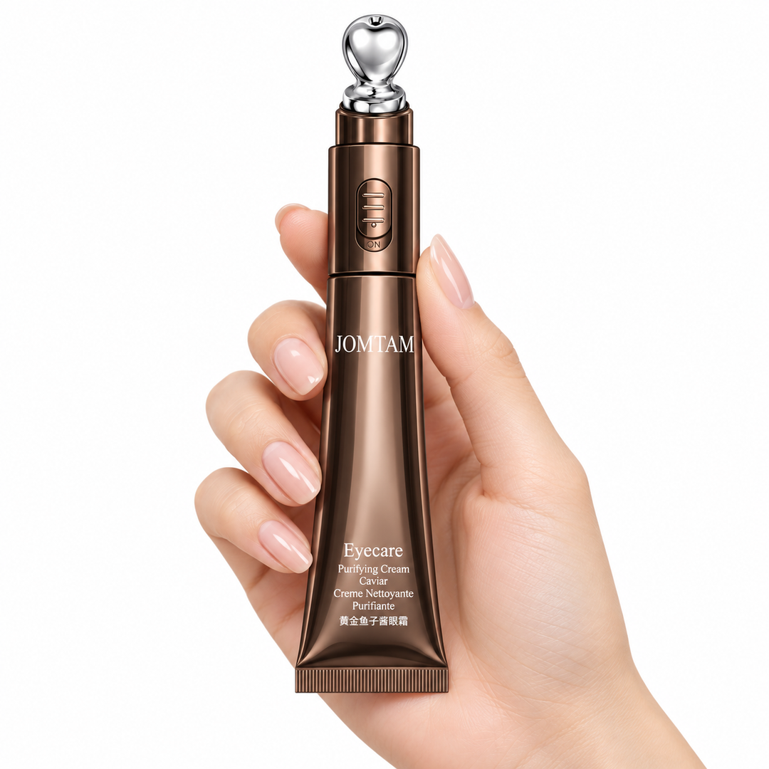 Hand holding the metallic applicator to show product scale
