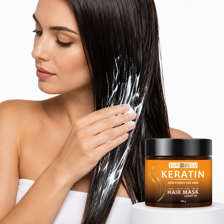 Keratin leave-in hair mask applied through long wet hair on a clean white studio background