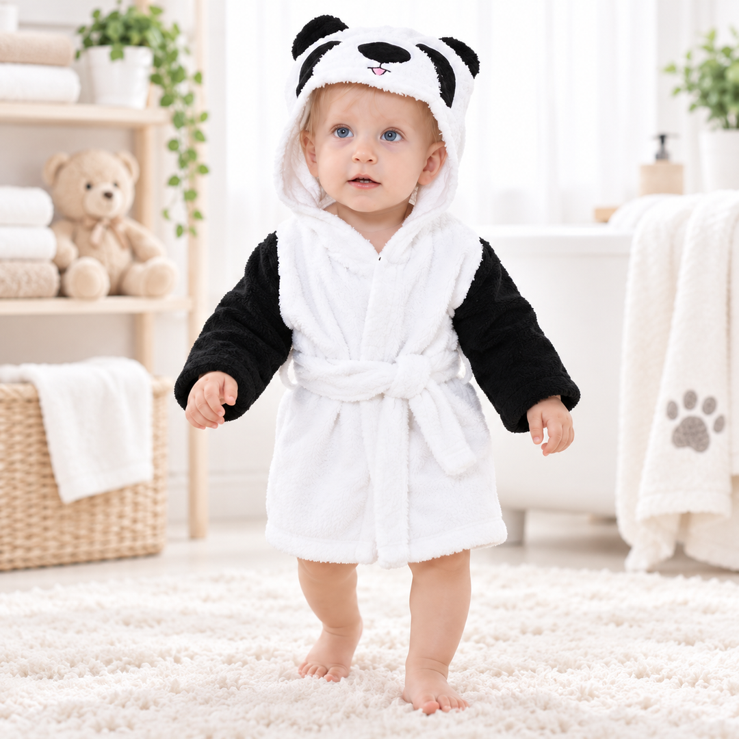 Child wearing the panda animal hooded bathrobe in a bright home setting, showing the hood, wrap front and waist belt.