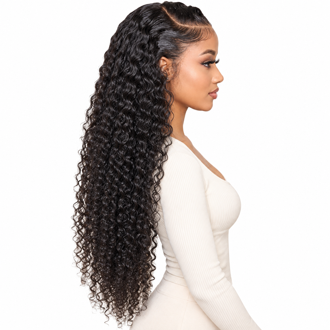 Side profile of an adult woman in natural-black curly lace front wig, showing the hairline and curl length on white backdrop.