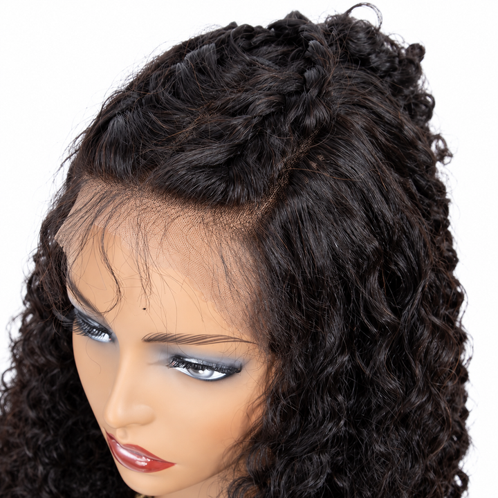 Close-up of a lace front wig on a mannequin, showing parting, transparent lace edge and natural-black hair on white backdrop.