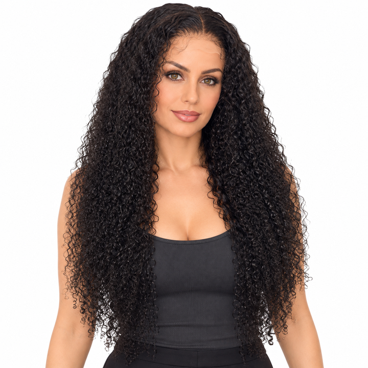 Second adult woman wearing a natural-black curly wig and charcoal top, with the hairline and curls visible on white backdrop.