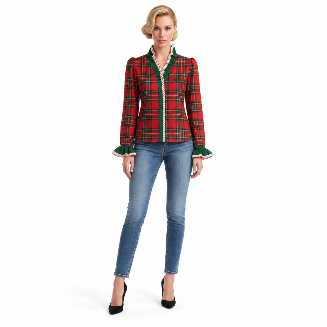 Red Power Look blouse with red plaid, green neckline ruffles and ruffle cuffs, worn with blue jeans and black heels in studio