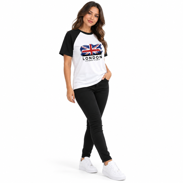 Three-quarter view of the city graphic tee with black raglan sleeves