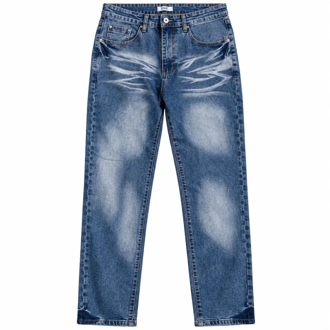 Front flat lay of blue denim jeans showing belt loops, HME label, button, front pockets, pale thigh fading and straight hems.