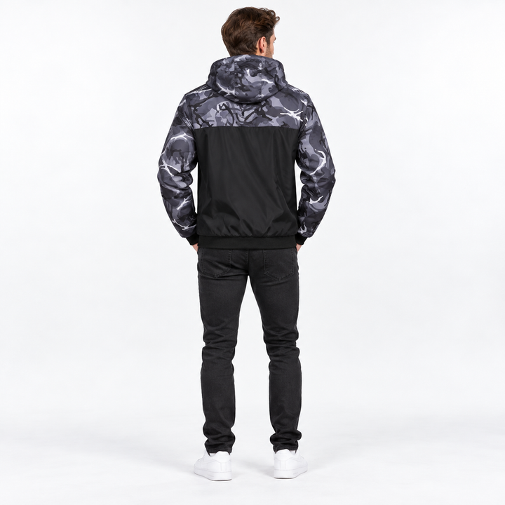 Gray camouflage jacket on model, rear studio view