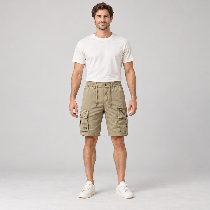 Front view of khaki cargo shorts with drawstrings and buttoned thigh pockets on a full-body model.