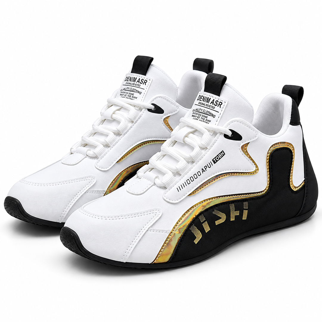 Men's colorblock sneakers in black and white with metallic trim, front three-quarter view