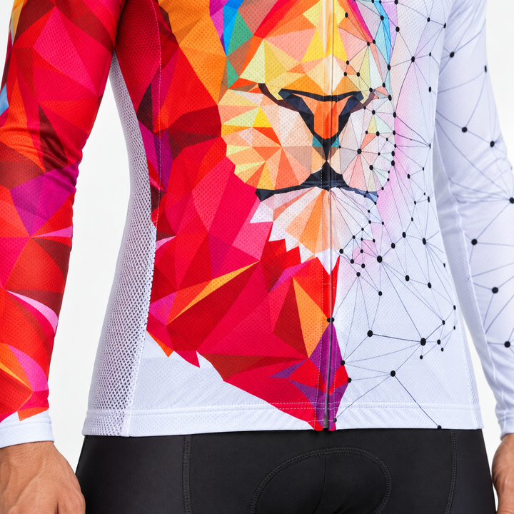 Close-up of red and white lion cycling top showing visible print details, seams and surface texture on a clean studio setting