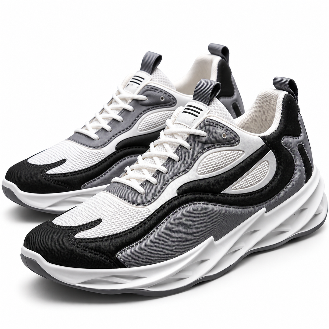 Gray men's mesh running sneakers on a clean white studio background
