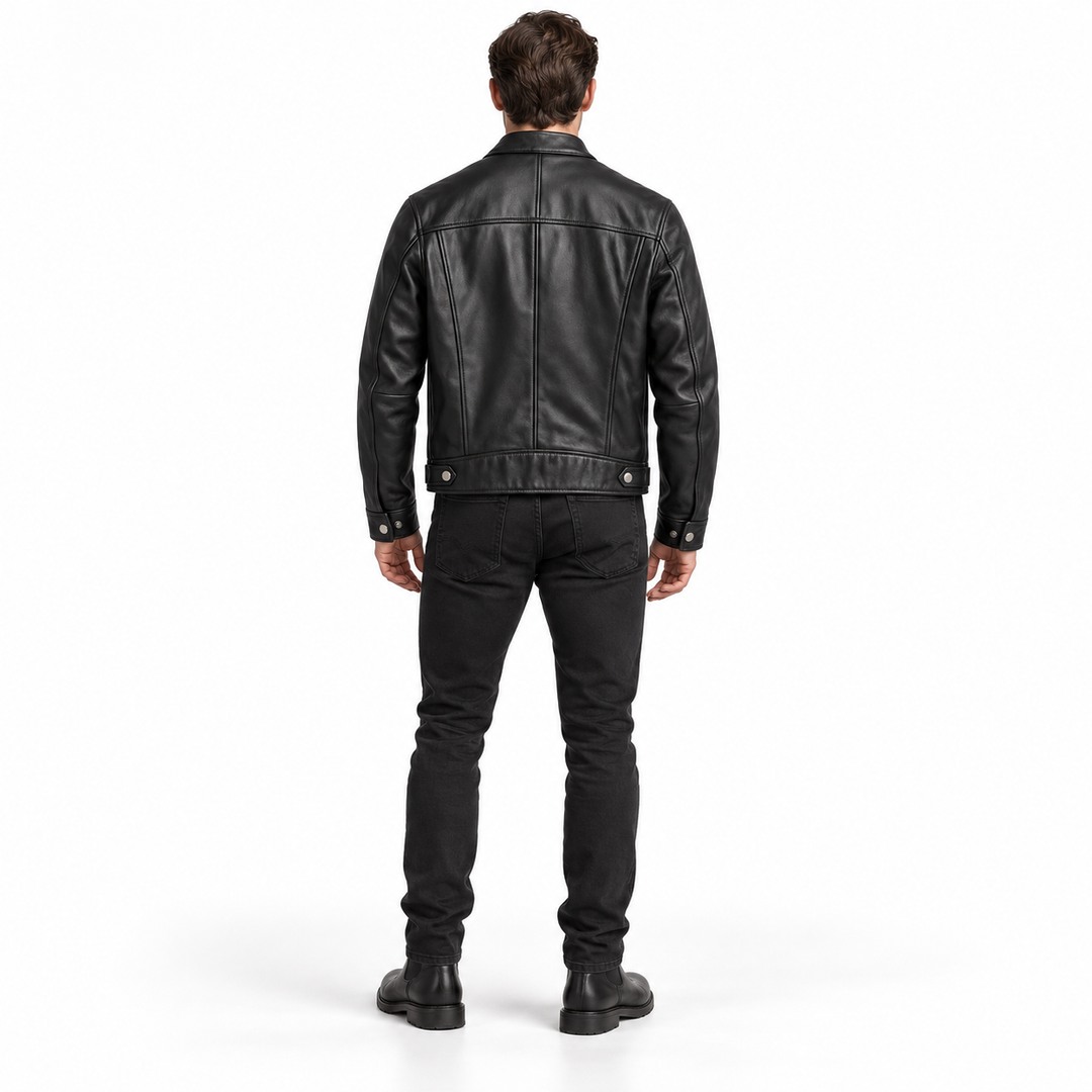 Black jacket rear view showing back seams, hem tabs and cuff snaps on a full-body model.